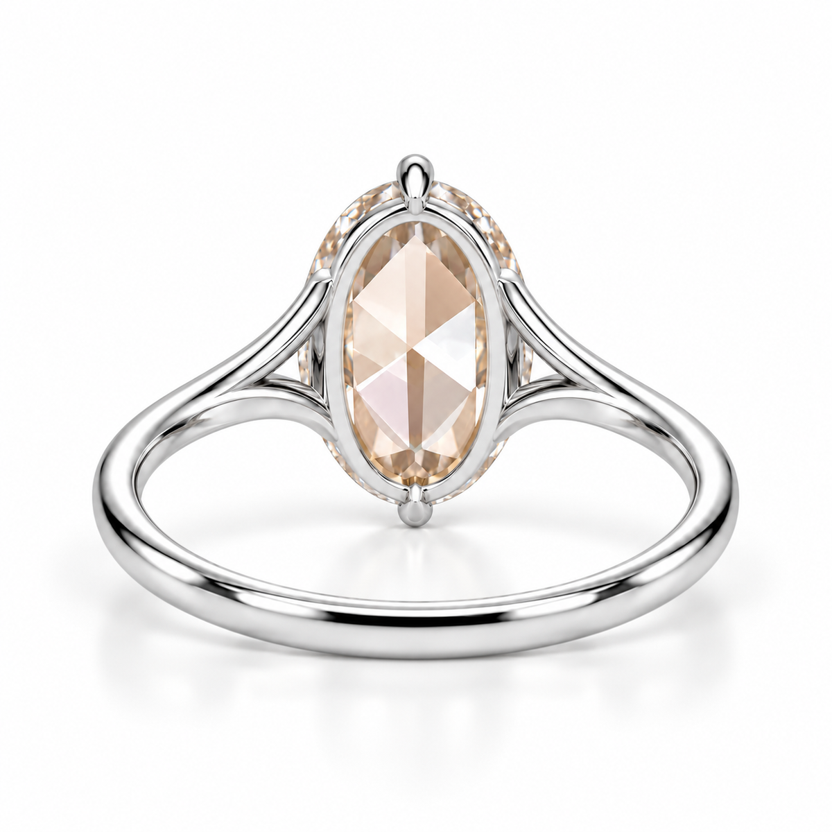 Oval rose-cut lab-grown diamond solitaire engagement ring with a four-prong compass setting and sculpted white-metal band