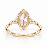 Oval rose-cut lab-grown diamond solitaire engagement ring with a four-prong compass setting and sculpted white-metal band