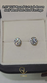 round cut bezel set stud earrings
