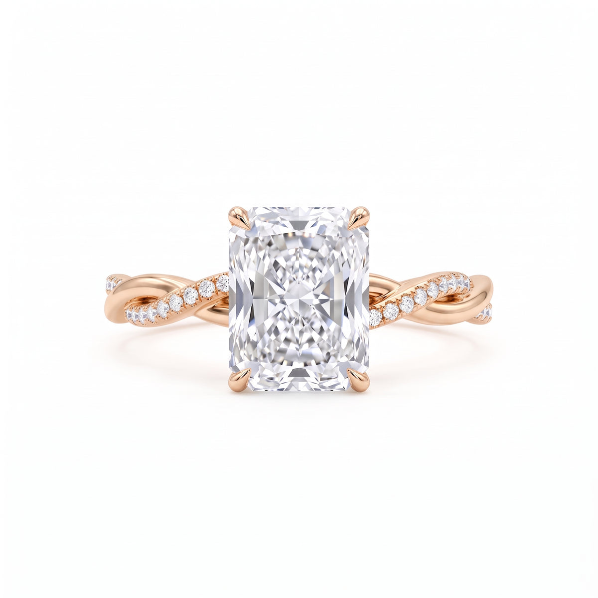 Radiant-cut engagement ring with four claw prongs and a twisted white-metal band combining polished and pavé-set strands