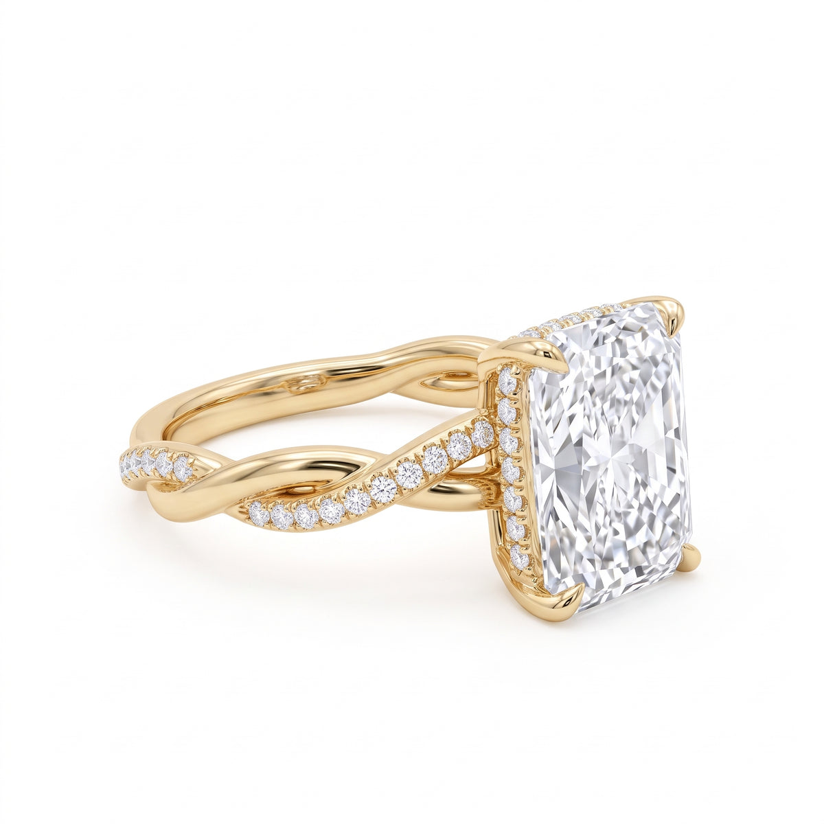 Radiant-cut engagement ring with four claw prongs and a twisted white-metal band combining polished and pavé-set strands