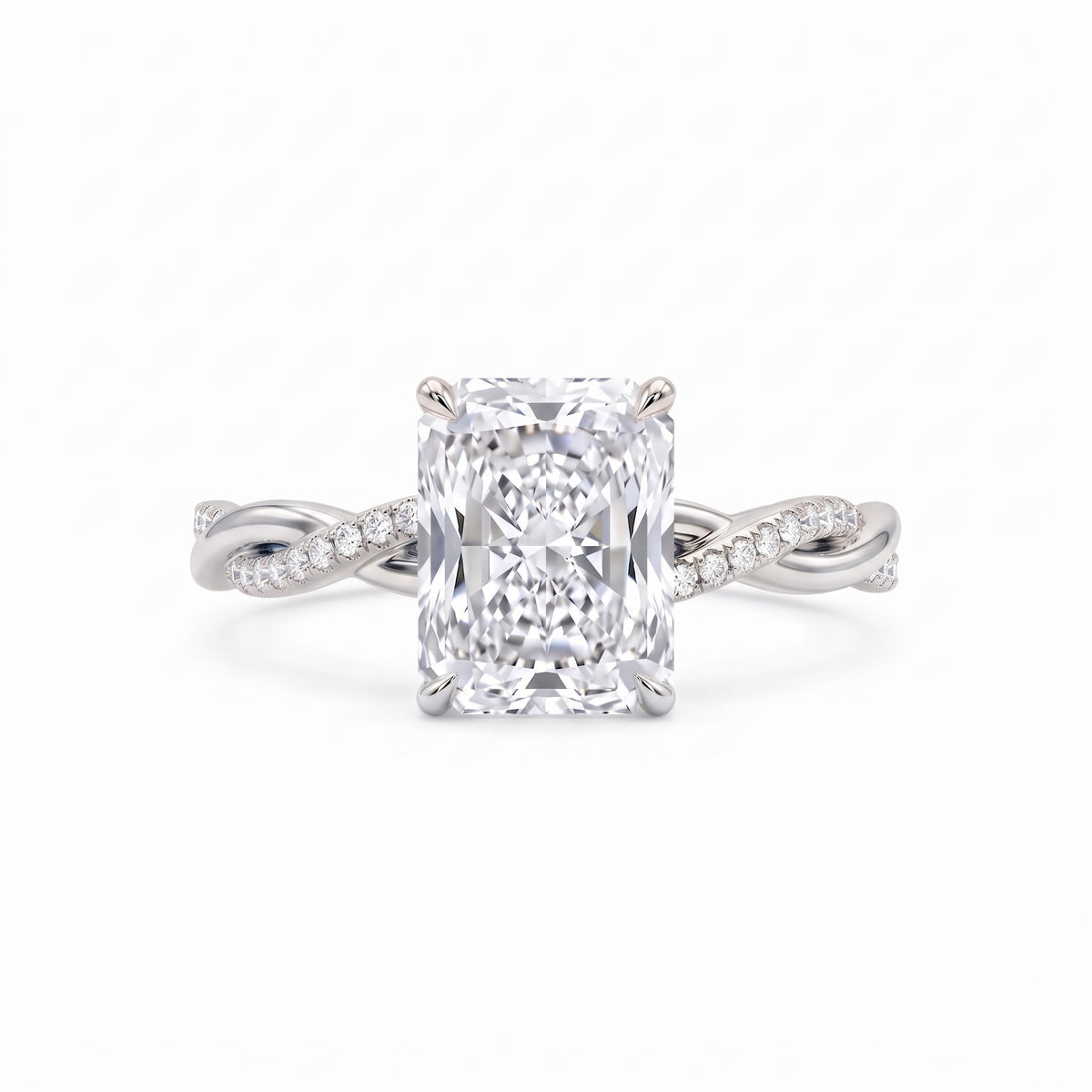 Radiant-cut engagement ring with four claw prongs and a twisted white-metal band combining polished and pavé-set strands