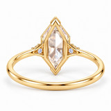 Marquise-cut lab-grown diamond engagement ring with two round side diamonds, V-shaped tip protection and a polished white-metal band