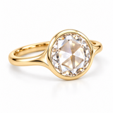 Round rose-cut lab-grown diamond solitaire ring with a smooth bezel setting and sculpted polished white-metal band