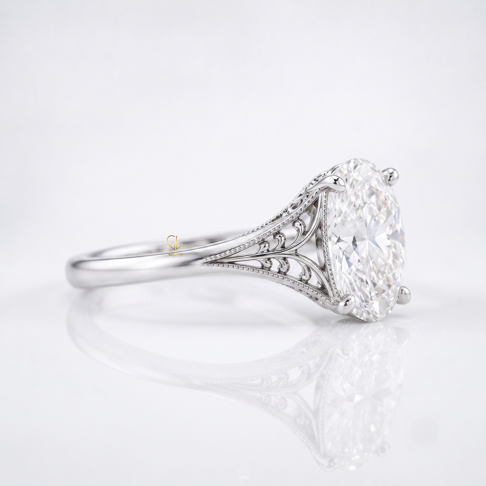 Vintage filigree oval cut lab-grown diamond solitaire ring, detail view of scrollwork, Gemlux Engagement Collection