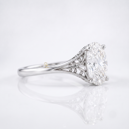 Vintage filigree oval cut lab-grown diamond solitaire ring, detail view of scrollwork, Gemlux Engagement Collection